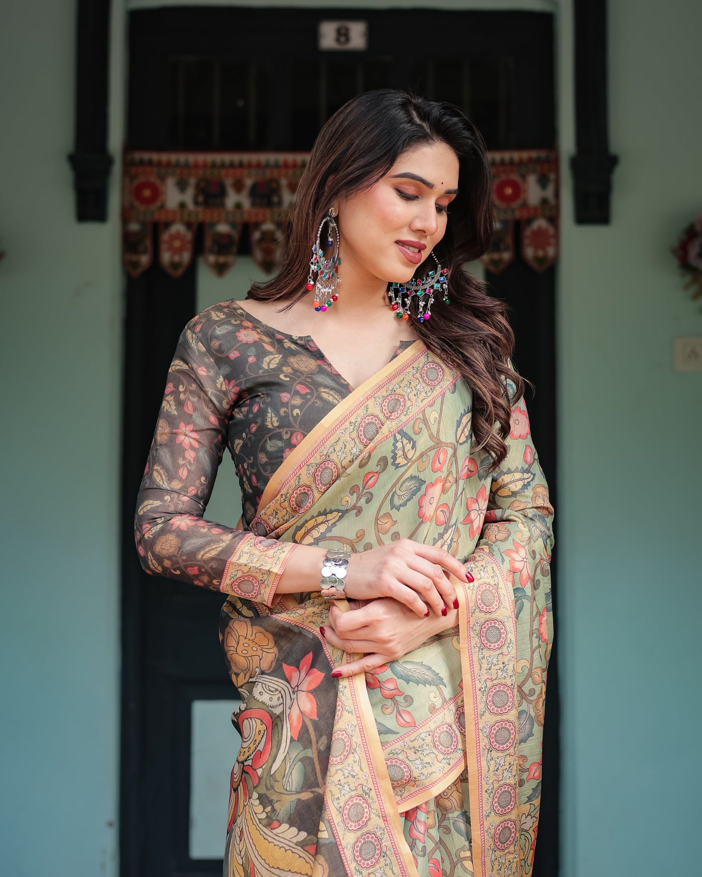 Sage Green with Bold Floral Motifs Linen Cotton Handloom Printed Saree, Vibrant Peacock Pallu, and Tassels