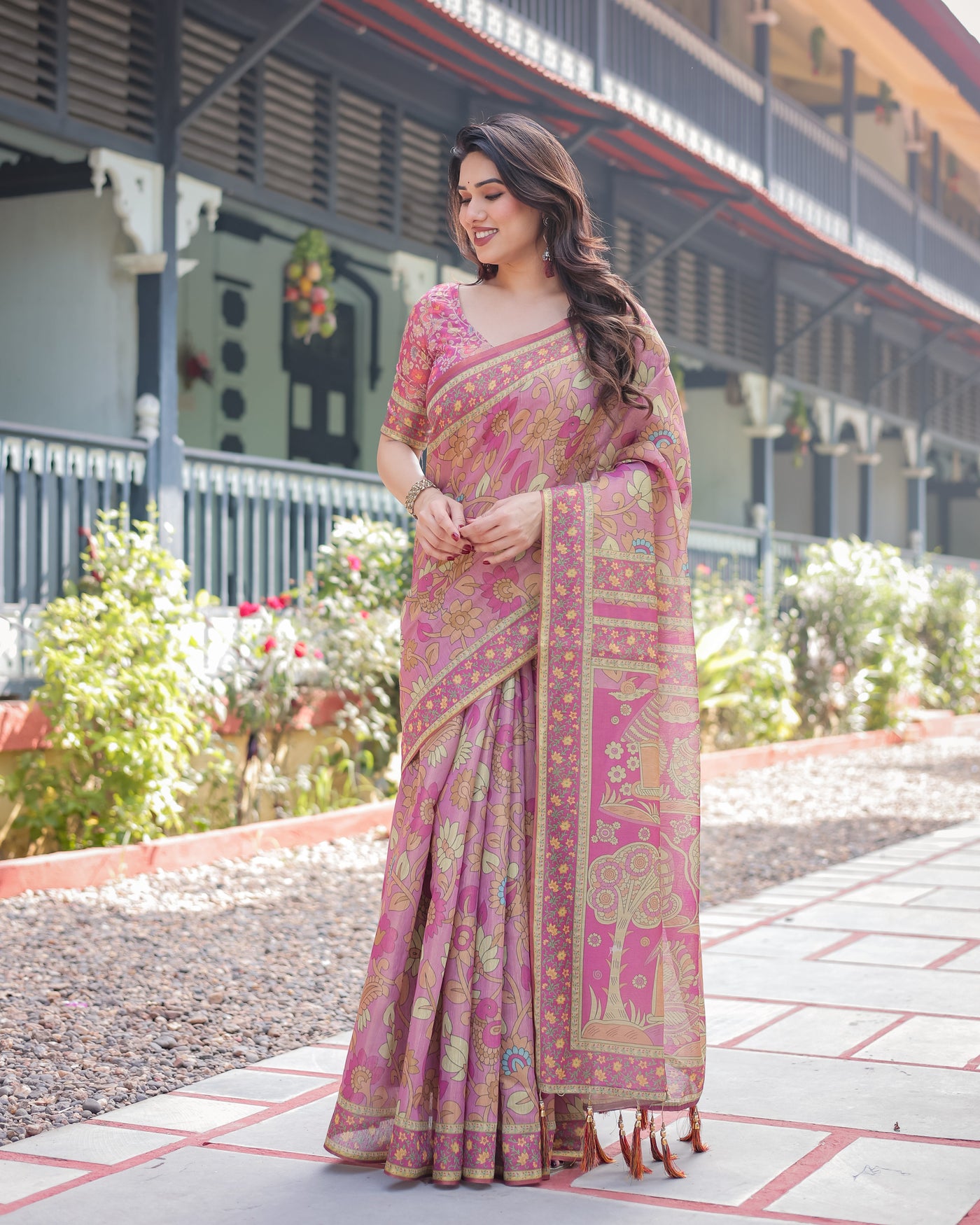 Regal Pink Handloom Cotton-Linen Saree with Floral Motifs, Golden Zari Highlights, and Tassel Detailing