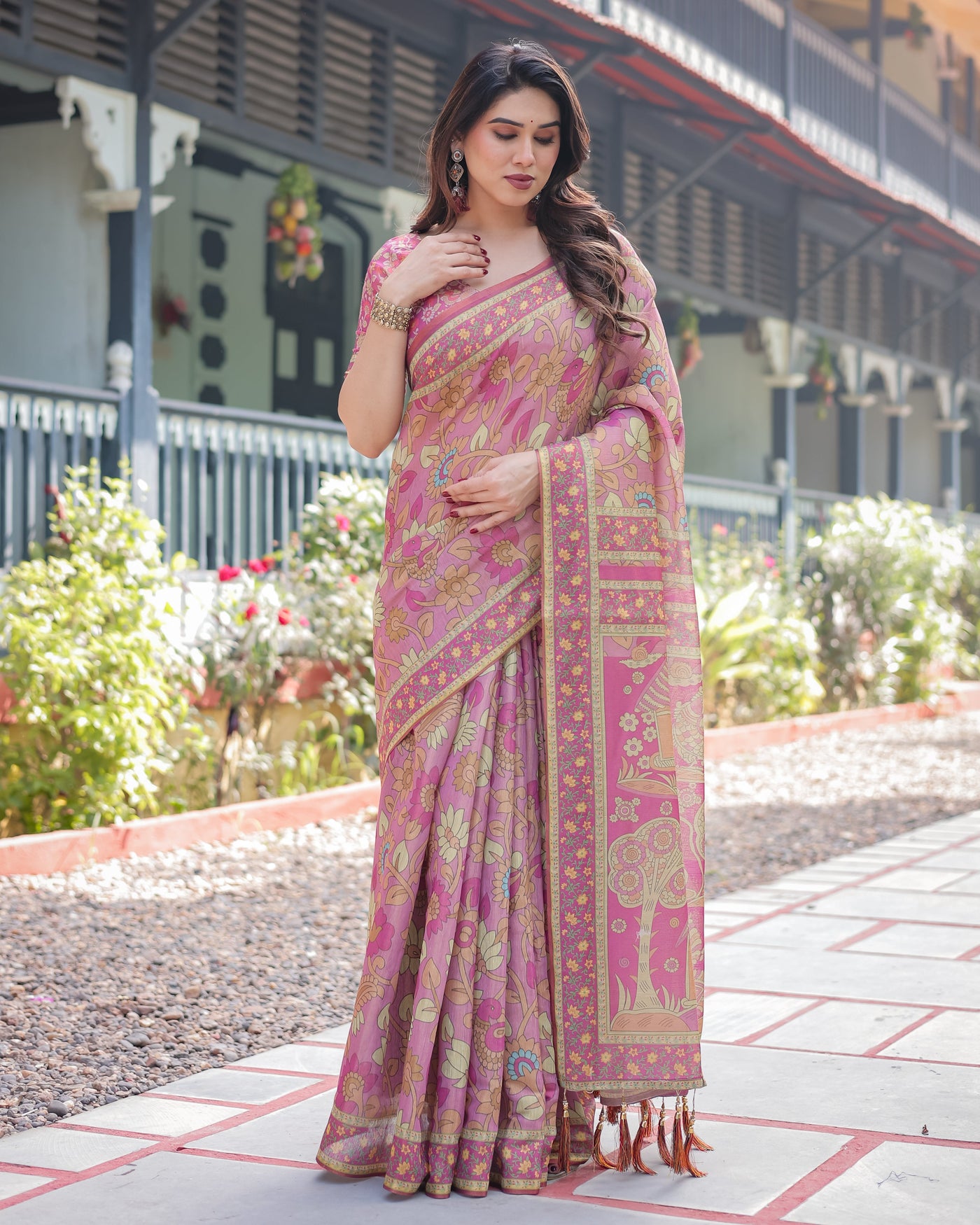 Regal Pink Handloom Cotton-Linen Saree with Floral Motifs, Golden Zari Highlights, and Tassel Detailing