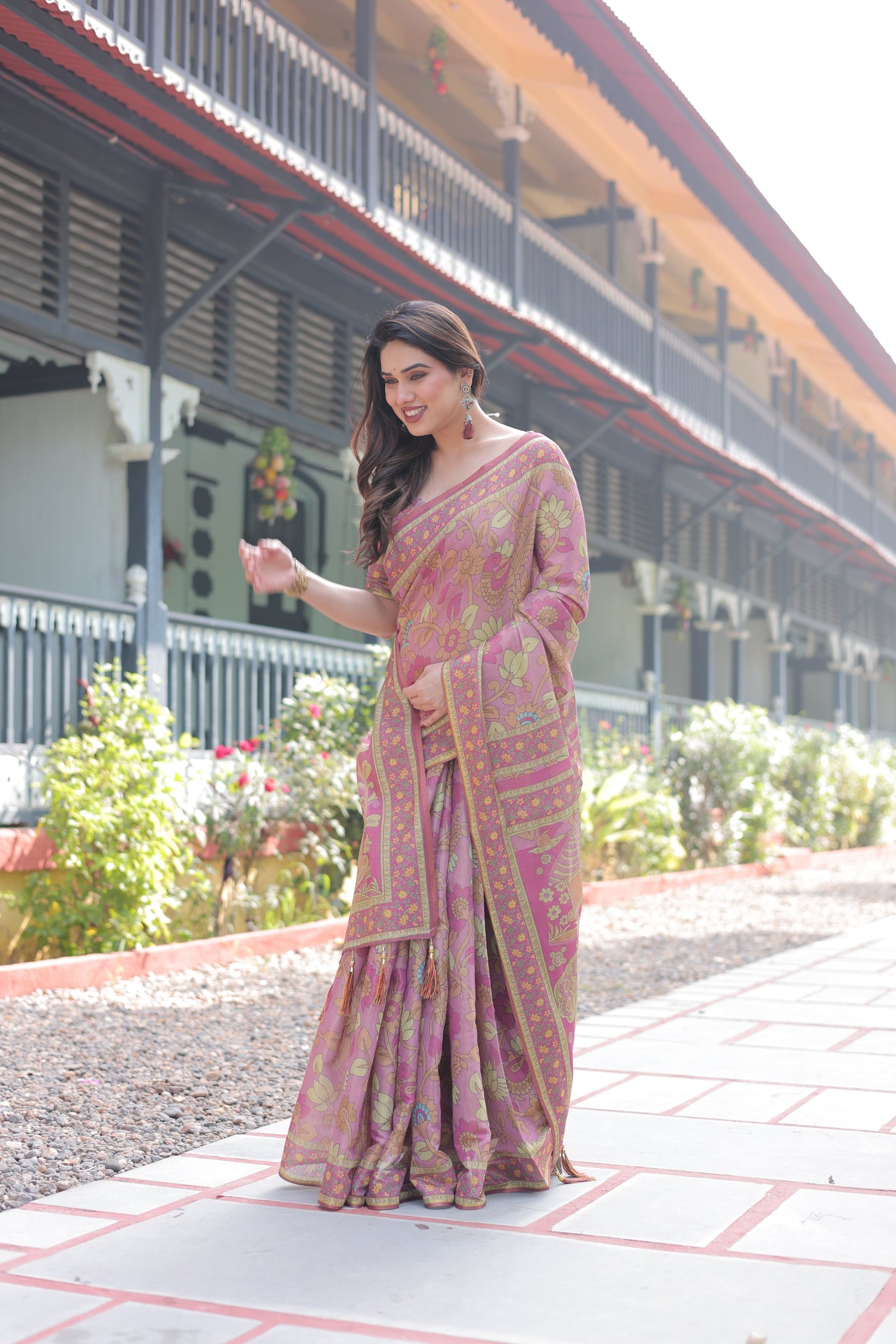 Regal Pink Handloom Cotton-Linen Saree with Floral Motifs, Golden Zari Highlights, and Tassel Detailing