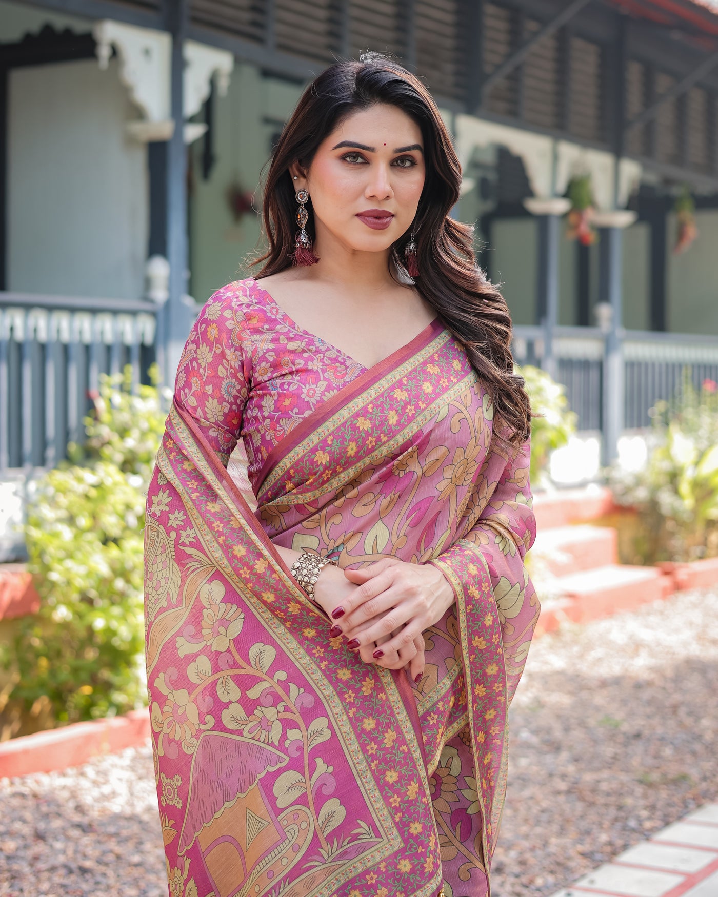 Regal Pink Handloom Cotton-Linen Saree with Floral Motifs, Golden Zari Highlights, and Tassel Detailing