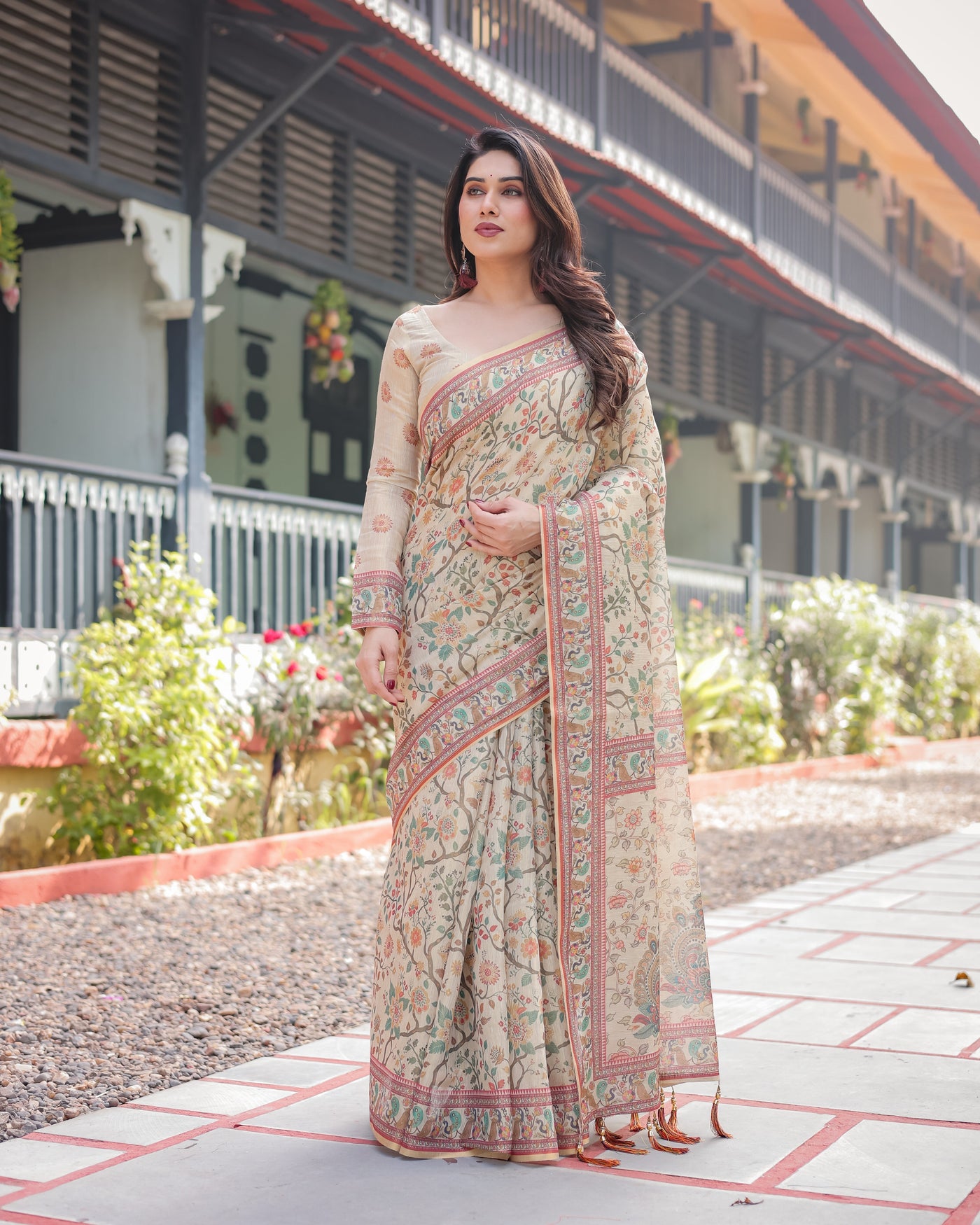 Ivory Handloom Cotton-Linen Saree with Floral and Peacock Motifs, Zari Highlights, and Tassel Finish