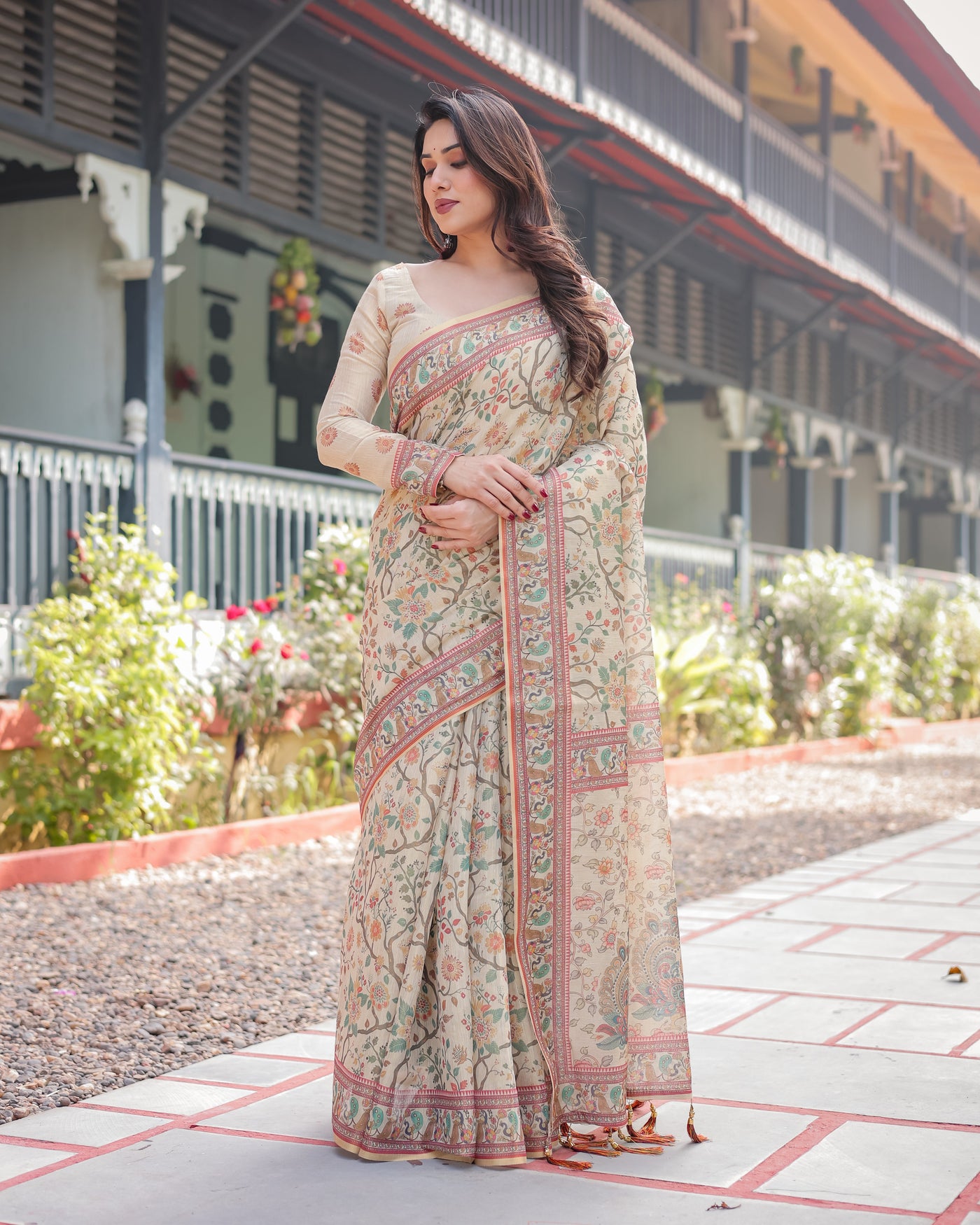 Ivory Handloom Cotton-Linen Saree with Floral and Peacock Motifs, Zari Highlights, and Tassel Finish