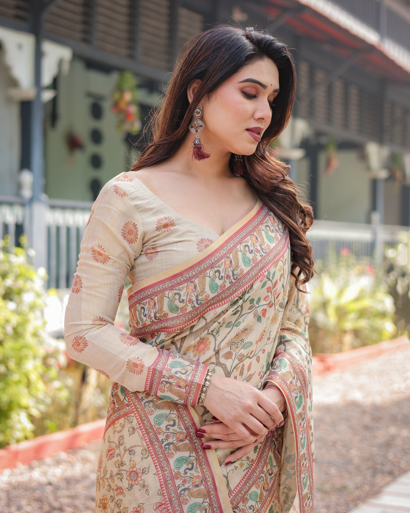 Ivory Handloom Cotton-Linen Saree with Floral and Peacock Motifs, Zari Highlights, and Tassel Finish