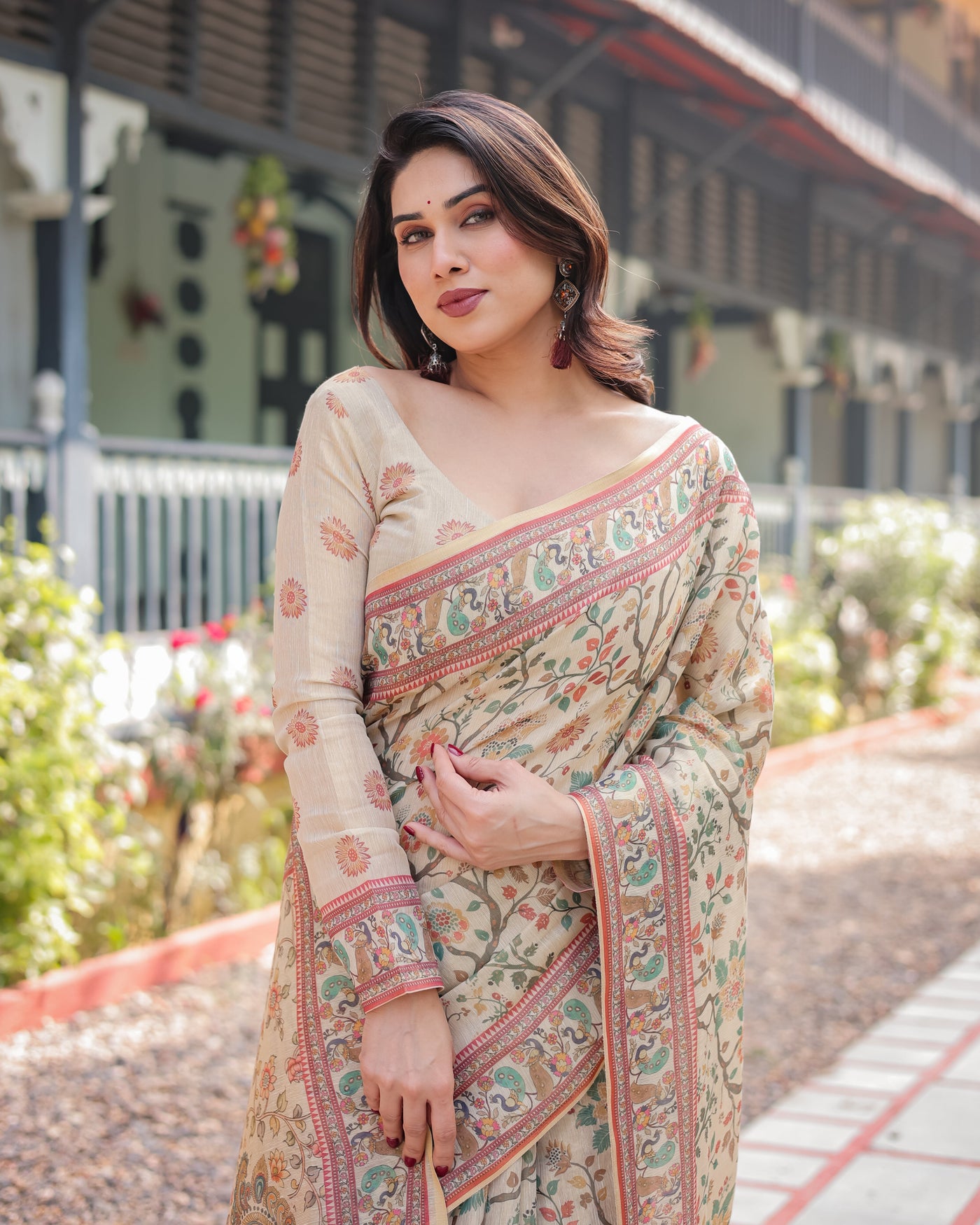 Ivory Handloom Cotton-Linen Saree with Floral and Peacock Motifs, Zari Highlights, and Tassel Finish