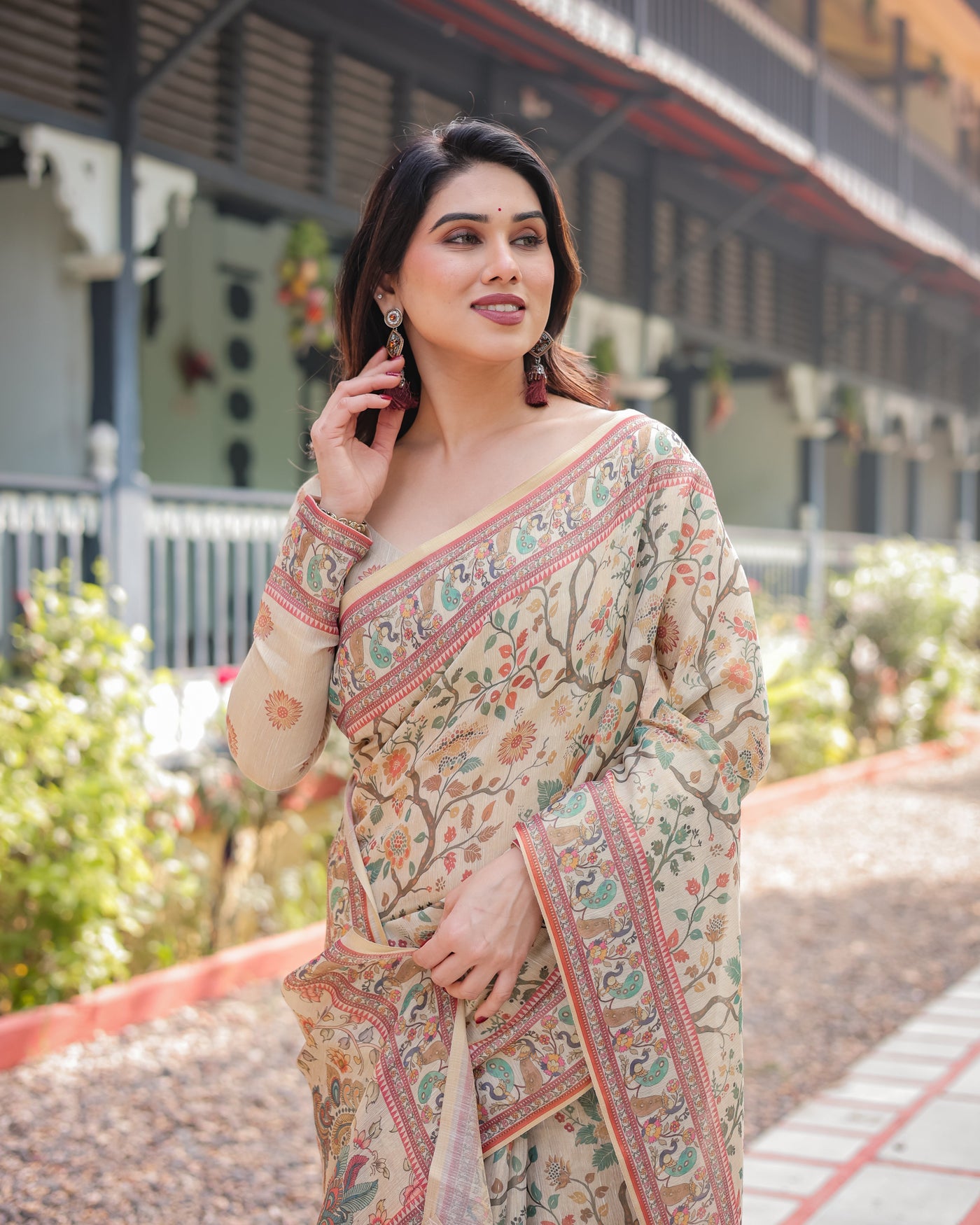 Ivory Handloom Cotton-Linen Saree with Floral and Peacock Motifs, Zari Highlights, and Tassel Finish