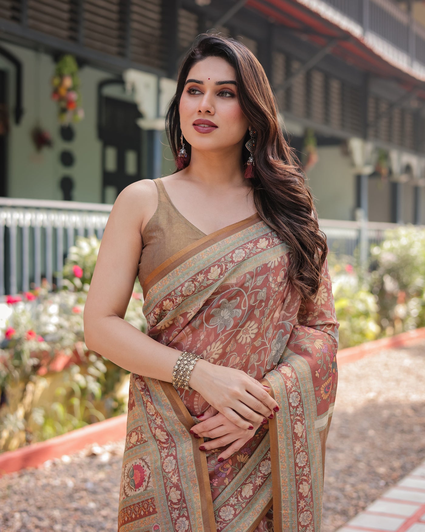 Rust and Gold Handloom Cotton-Linen Saree with Floral Motifs and Rich Zari Border