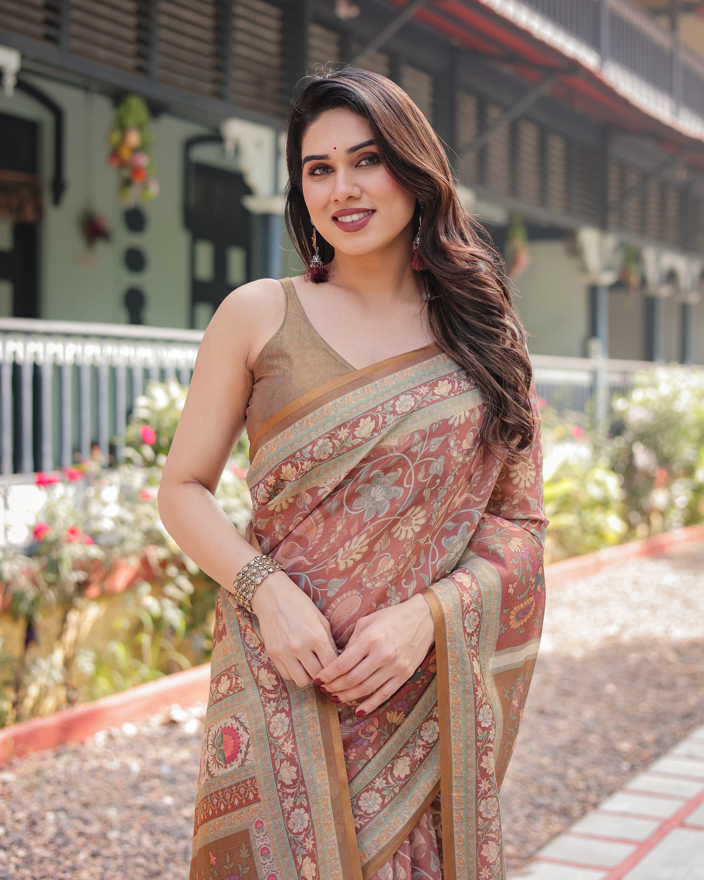 Rust and Gold Handloom Cotton-Linen Saree with Floral Motifs and Rich Zari Border