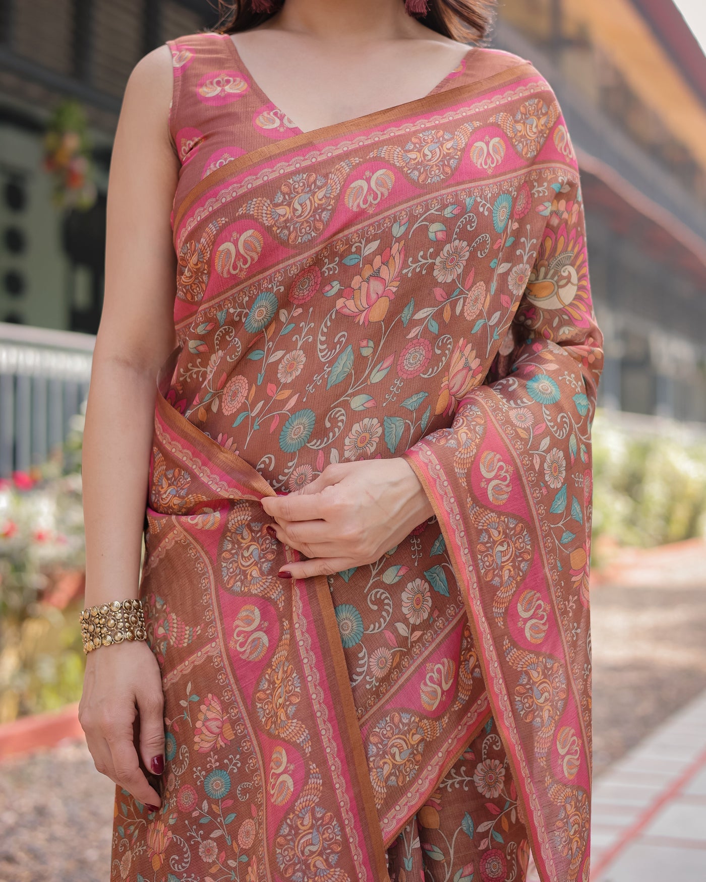 Copper Brown Handloom Cotton-Linen Saree with Floral Motifs and Vibrant Pink Accents