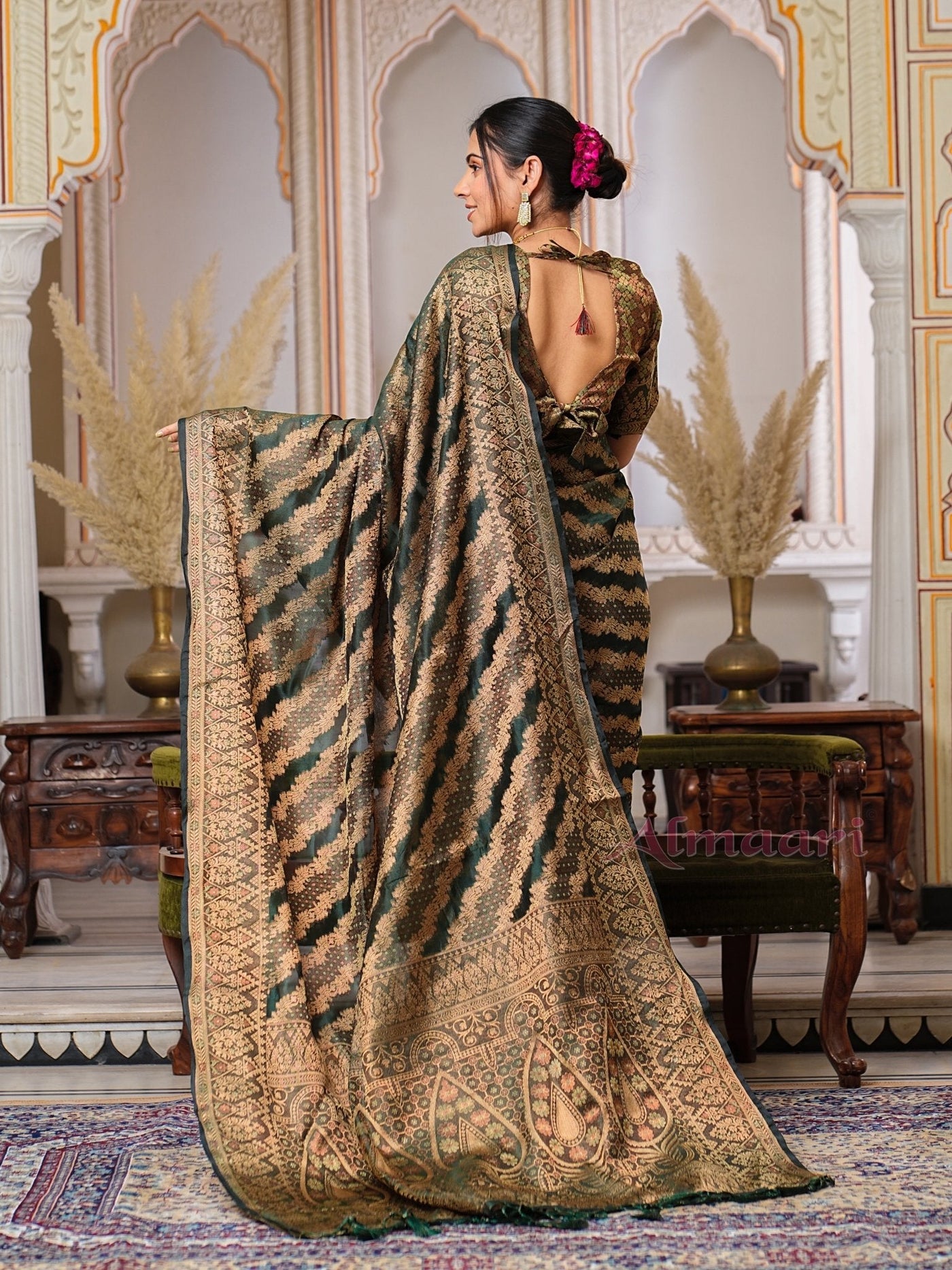 Dark Green Color Pure Organza Saree Adorned with Zari Weaving, Complete with Matching Blouse Piece - Almaari Fashion