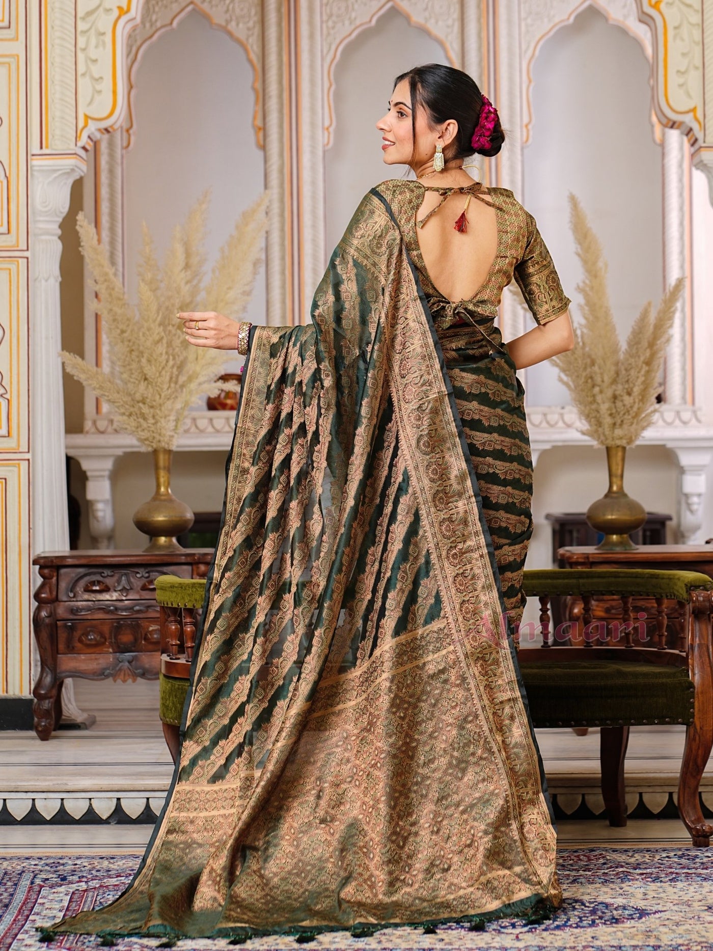 Dark Green Color Pure Organza Saree Adorned with Zari Weaving, Complete with Matching Blouse Piece - Almaari Fashion