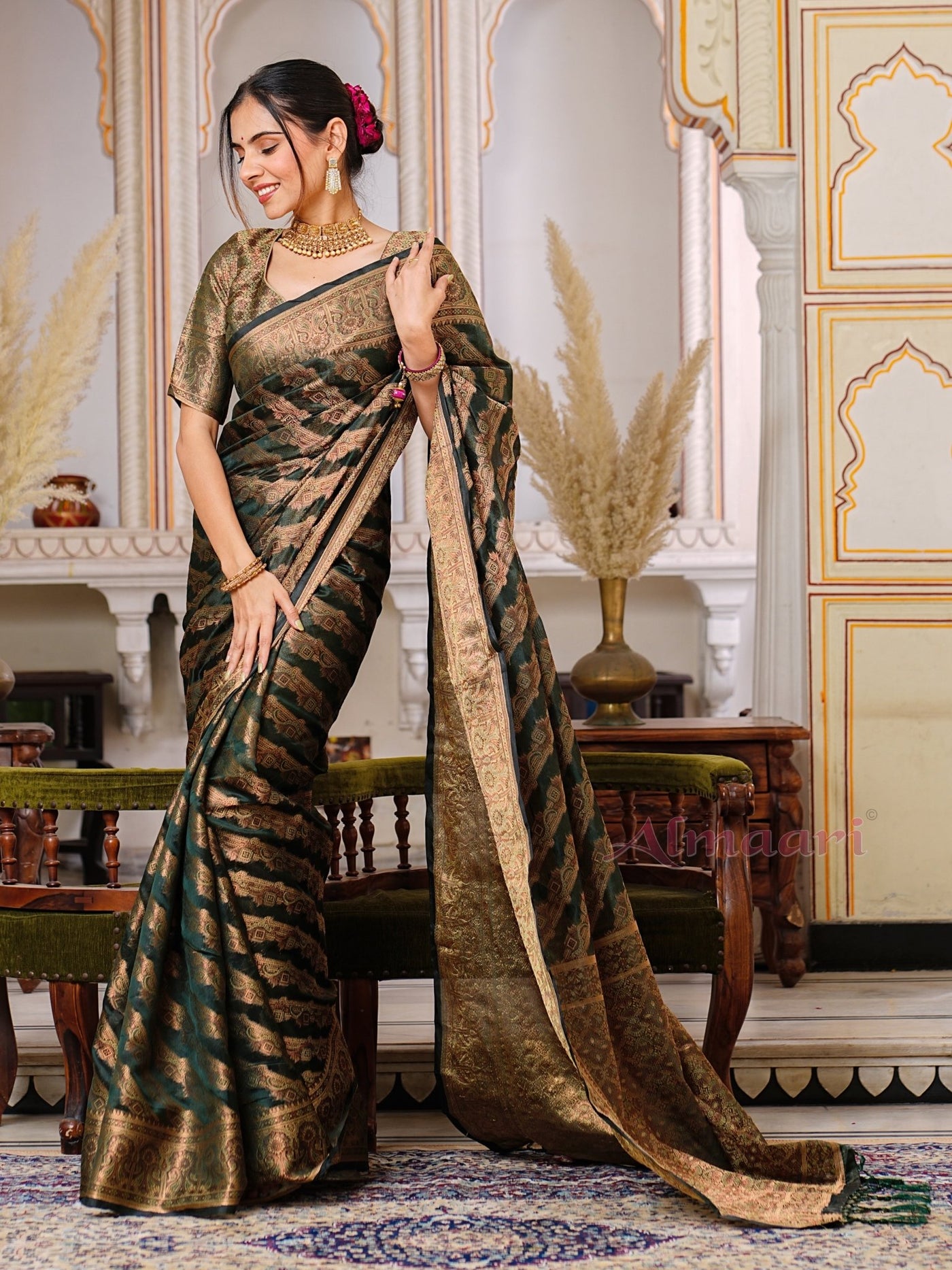 Dark Green Color Pure Organza Saree Adorned with Zari Weaving, Complete with Matching Blouse Piece - Almaari Fashion