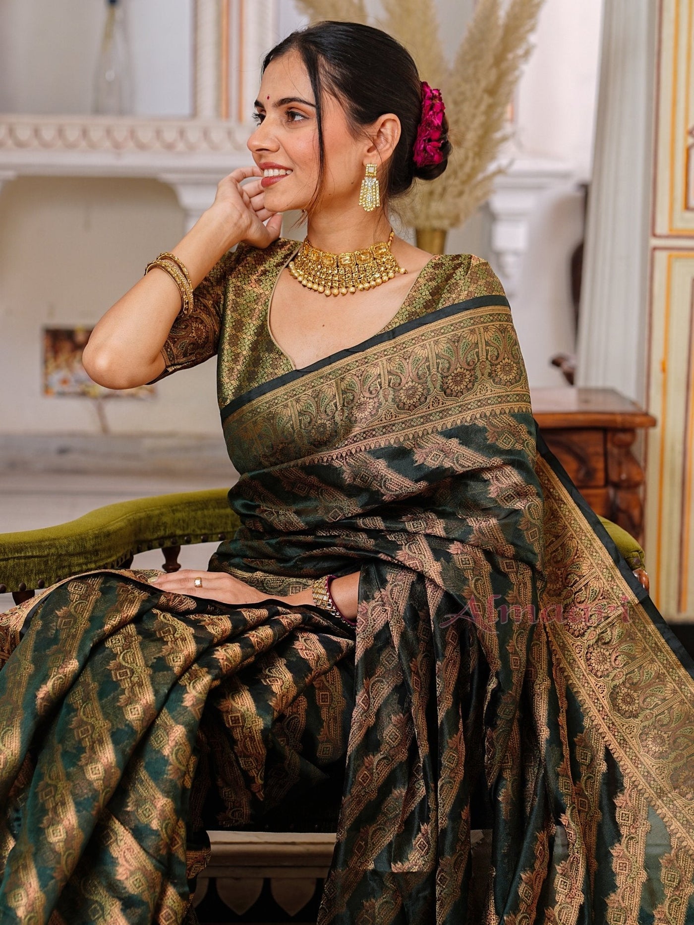 Dark Green Color Pure Organza Saree Adorned with Zari Weaving, Complete with Matching Blouse Piece - Almaari Fashion