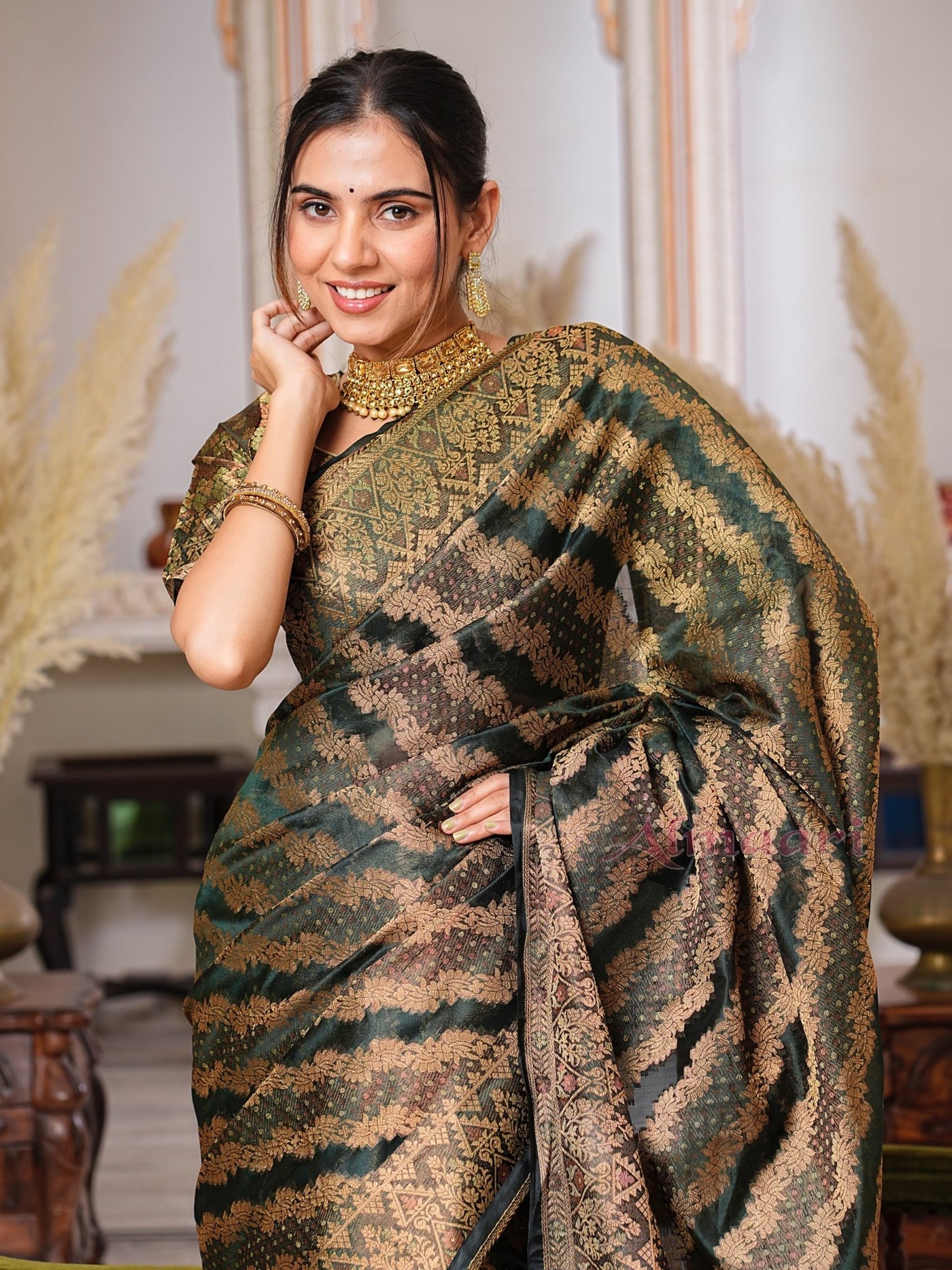 Dark Green Color Pure Organza Saree Adorned with Zari Weaving, Complete with Matching Blouse Piece - Almaari Fashion