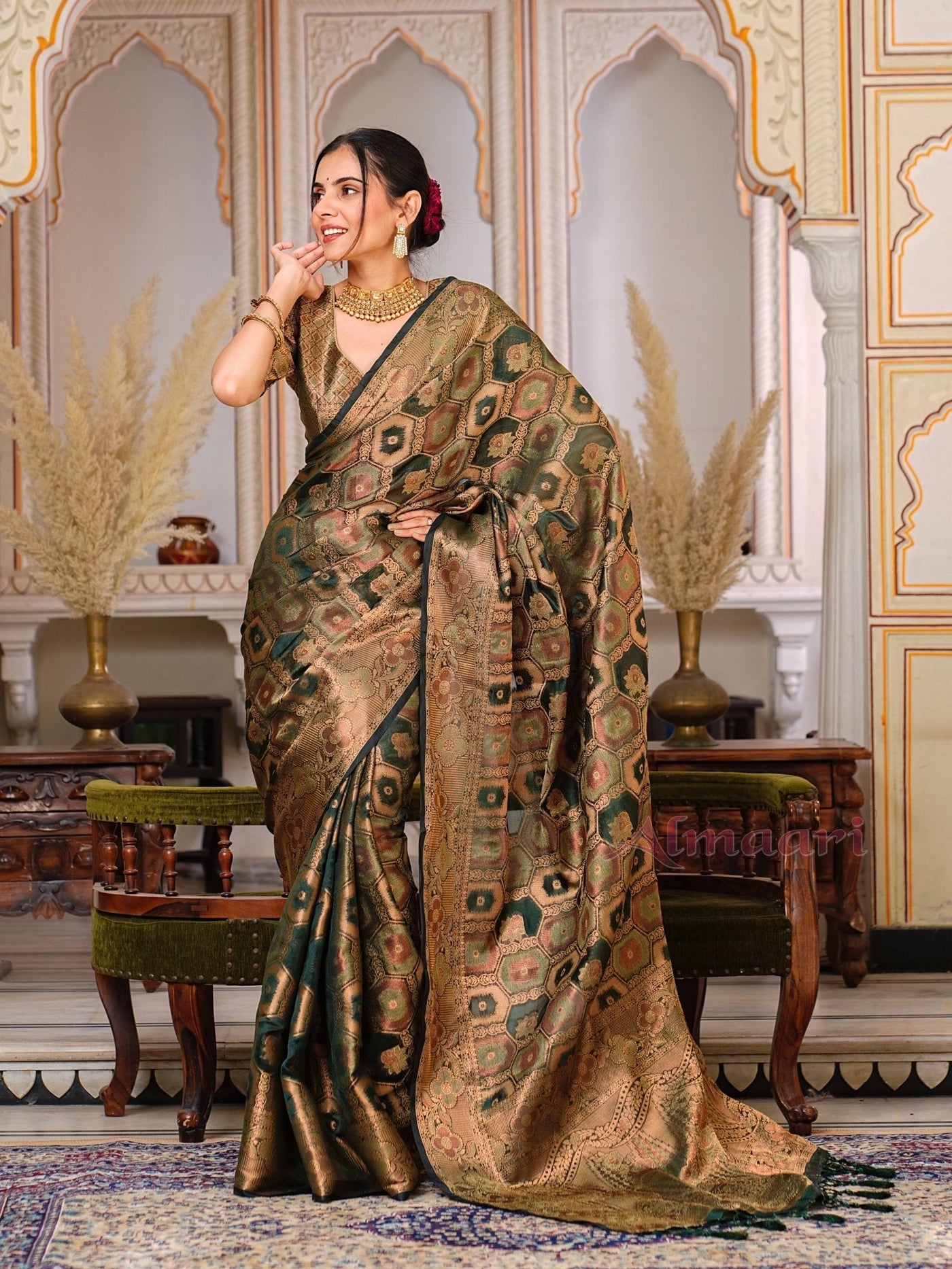 Dark Green Color Pure Organza Saree Adorned with Zari Weaving, Complete with Matching Blouse Piece - Almaari Fashion