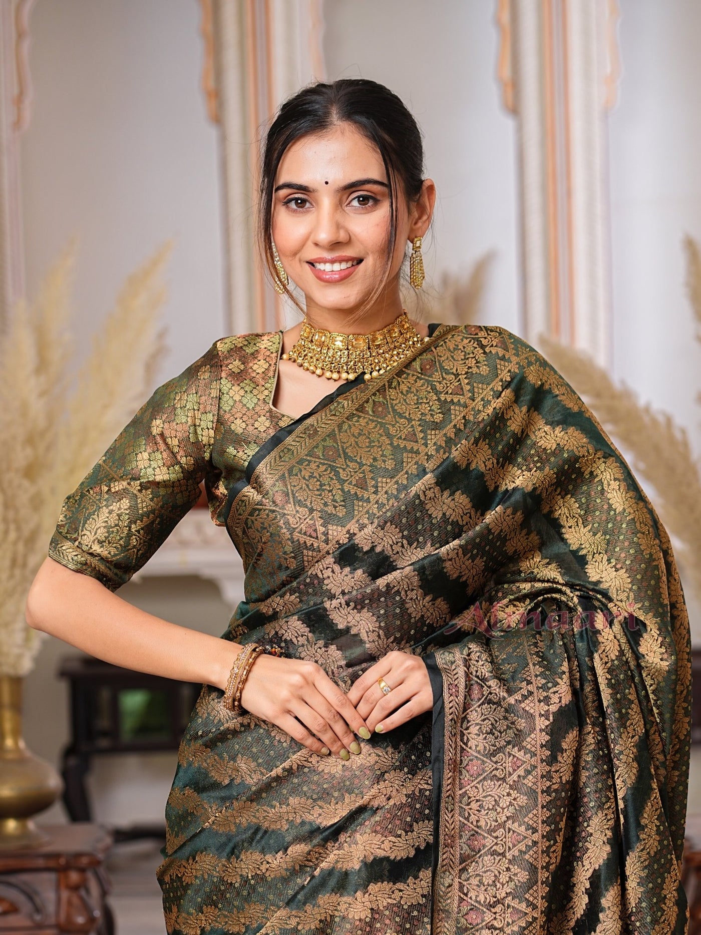 Dark Green Color Pure Organza Saree Adorned with Zari Weaving, Complete with Matching Blouse Piece - Almaari Fashion