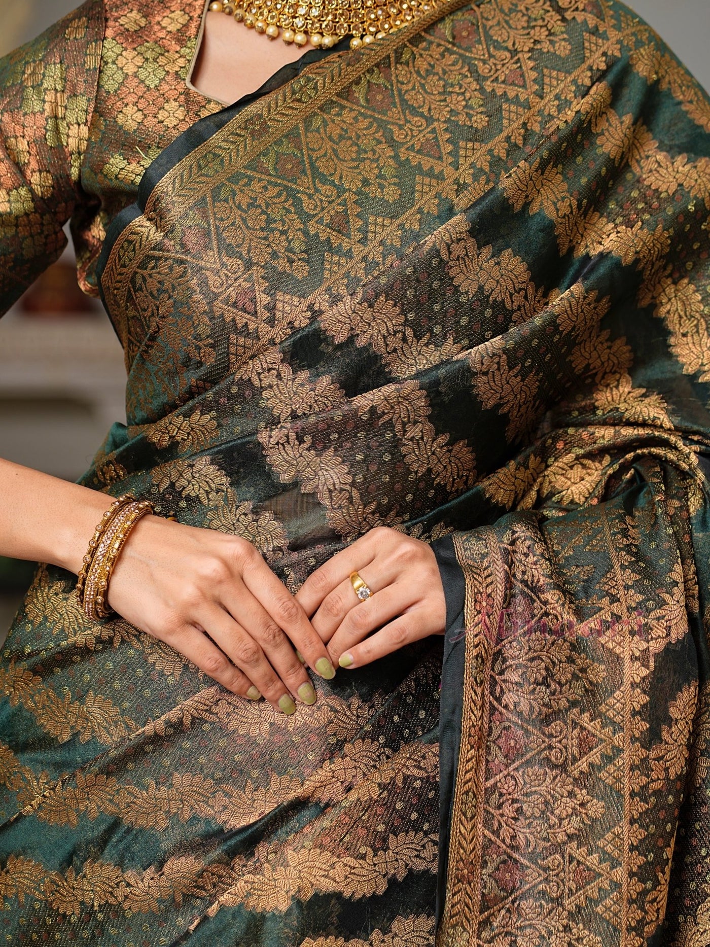 Dark Green Color Pure Organza Saree Adorned with Zari Weaving, Complete with Matching Blouse Piece - Almaari Fashion