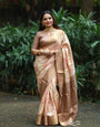 Pastel Peach Banarasi Silk Saree with Golden Zari Border & Subtle Floral Print