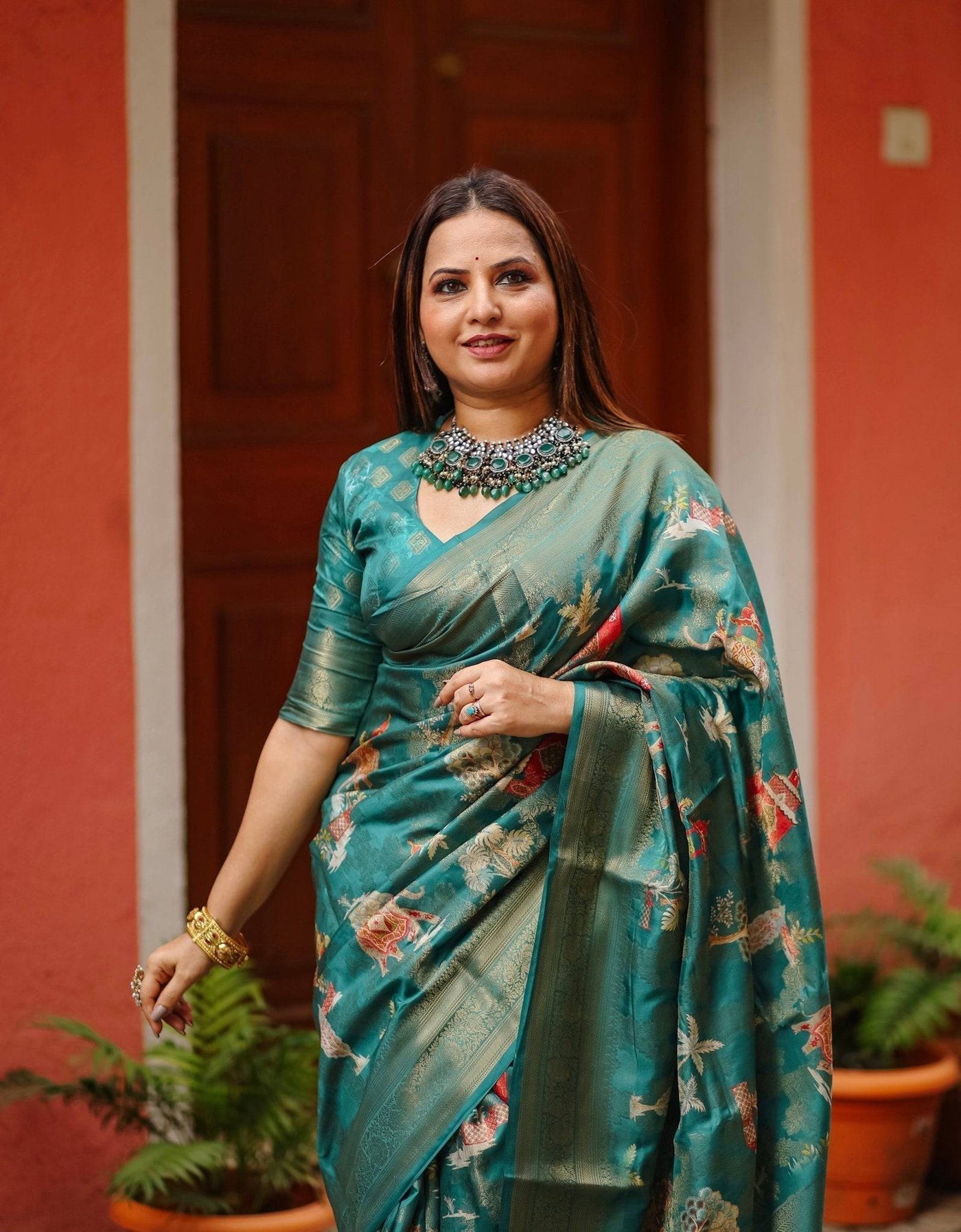 Teal Banarasi Silk Saree with Zari Weave Border & Intricate Traditional Motifs