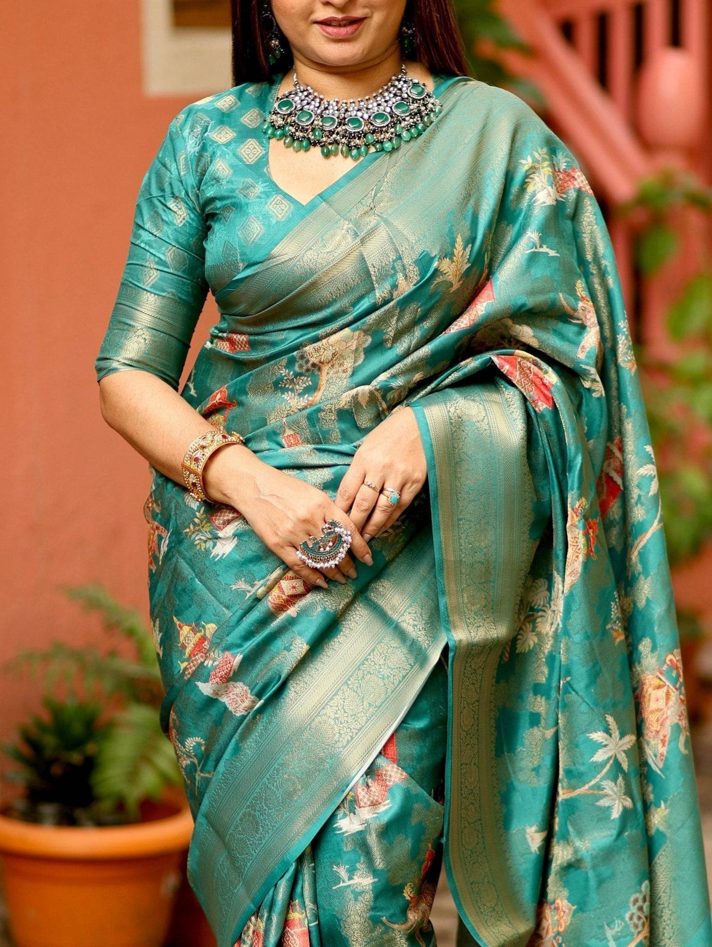 Teal Banarasi Silk Saree with Zari Weave Border & Intricate Traditional Motifs