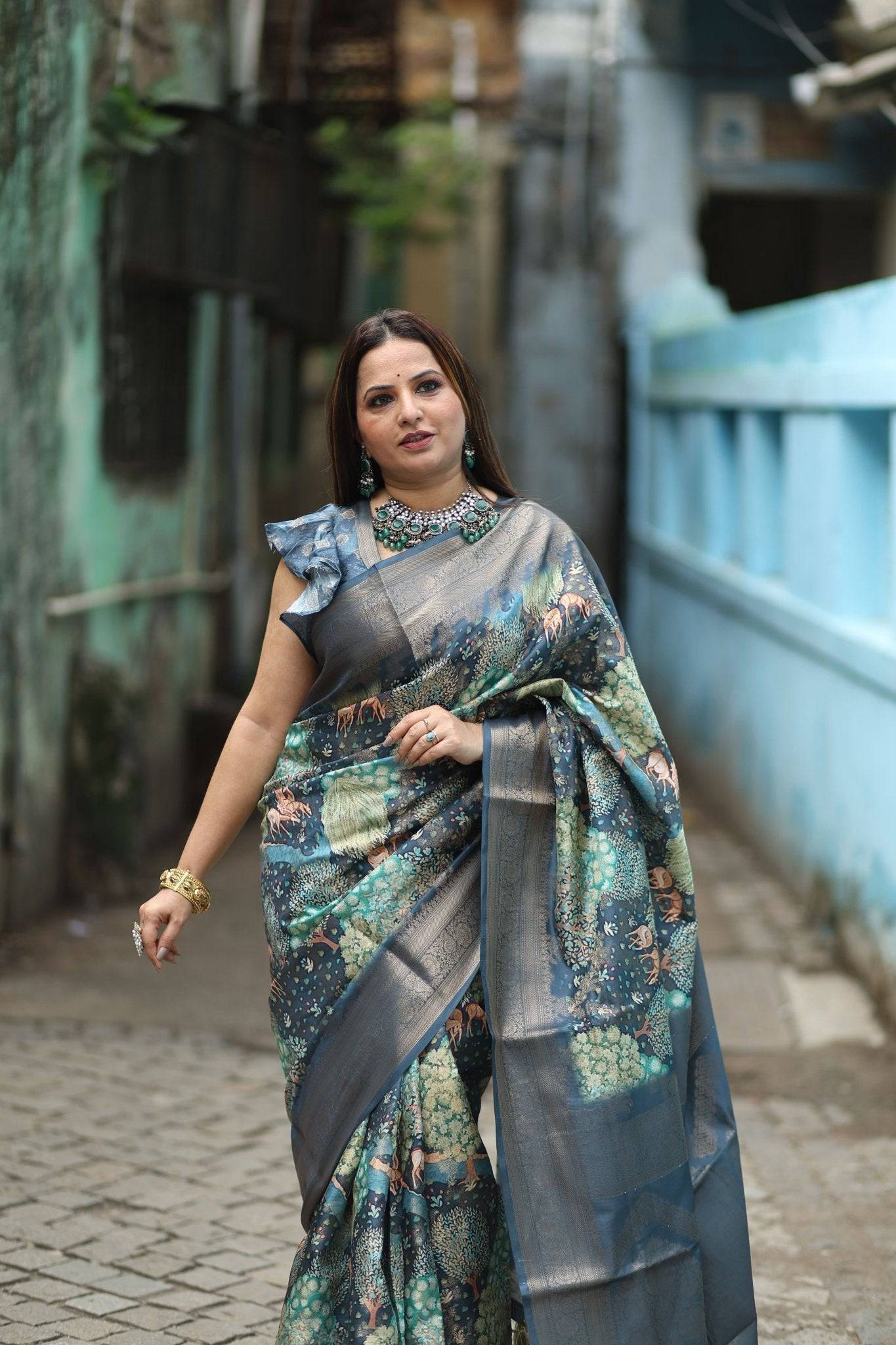 Elegant Teal Blue Banarasi Silk Saree with Forest-Inspired Motifs and Tassels