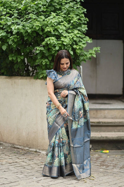 Elegant Teal Blue Banarasi Silk Saree with Forest-Inspired Motifs and Tassels