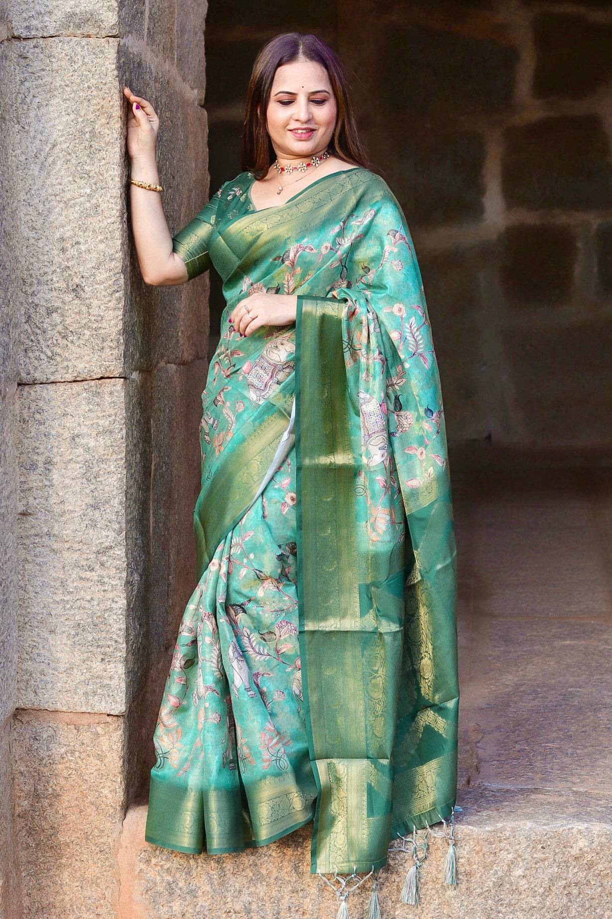 Graceful Emerald Green Banarasi Silk Saree with Floral Zari Accents