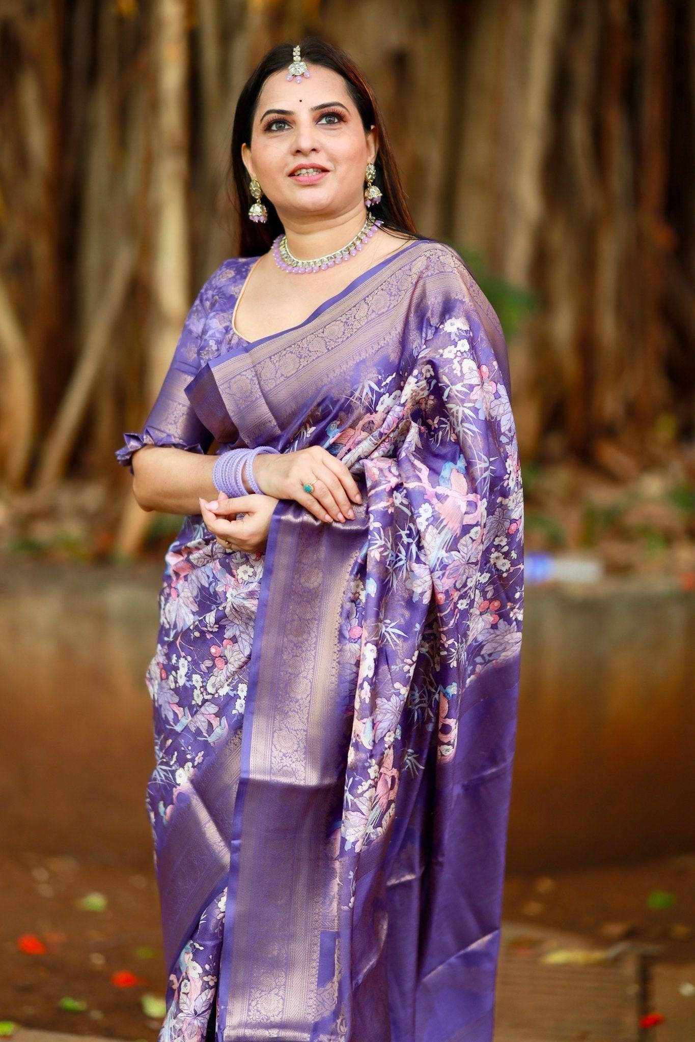 Regal Purple Banarasi Silk Saree with Floral Motifs and Elegant Tassels