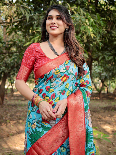 Aqua Blue Tussar Silk Saree with Vibrant Nature-Inspired Prints and Red Zari Border