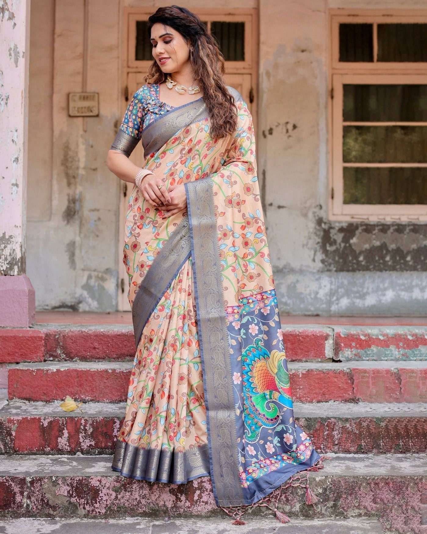 Peach and Navy Blue Floral Saree with Vibrant Peacock Pallu and Tassel Detailing