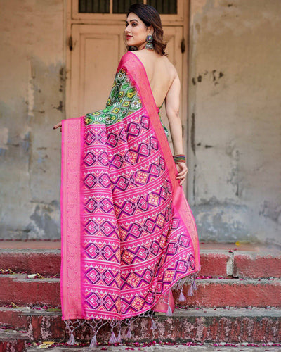 Green and Pink Tussar Silk Saree with Vibrant Ikat Patterns and Zari Border