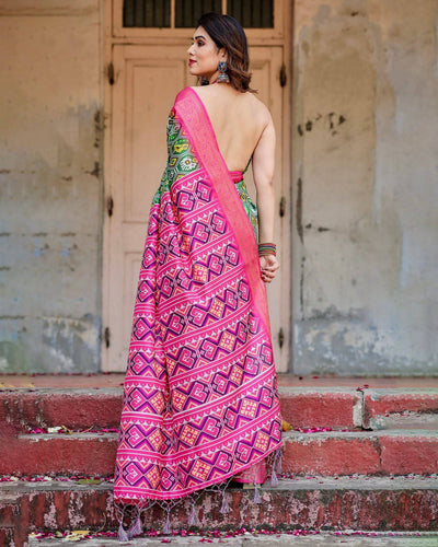 Green and Pink Banarasi Silk Saree with Vibrant Ikat Patterns and Zari Border