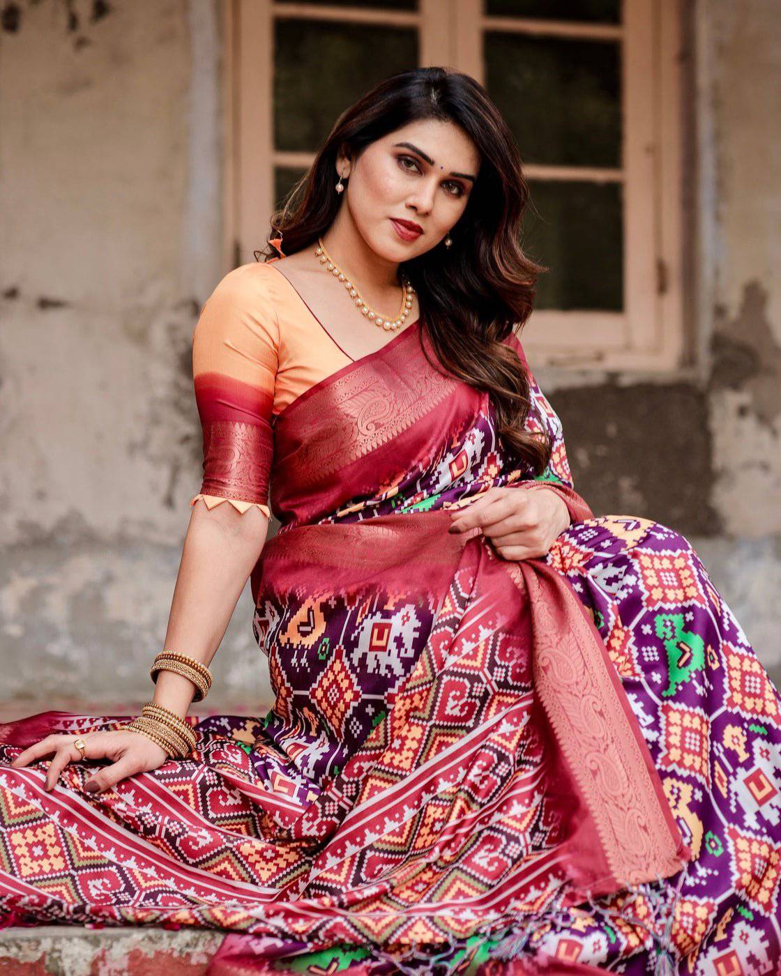 Wine Purple Banarasi Silk Saree with Ikat-Inspired Patterns and Rich Zari Border