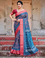 Teal Blue and Coral Tussar Silk Saree with Floral Weaves and Geometric Pallu