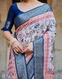 Ivory and Navy Blue Banarasi Silk Saree with Floral Elegance and Ornamental Zari Work