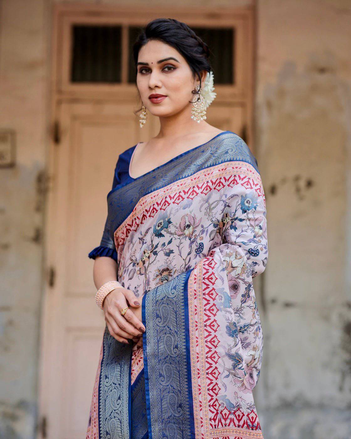 Ivory and Navy Blue Banarasi Silk Saree with Floral Elegance and Ornamental Zari Work