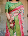 Blush Pink and Green Banarasi Silk Saree with Floral Prints and Intricate Zari Work