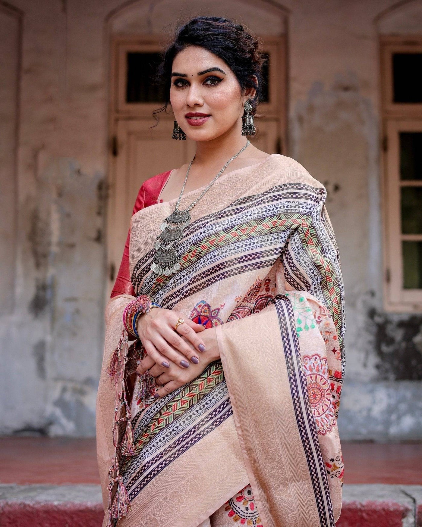 Elegant Peach Banarasi Silk Saree with Multicolor Embroidery and Tassels