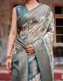 Graceful Teal Banarasi Silk Saree with Digital Vintage Prints and Zari Weaving