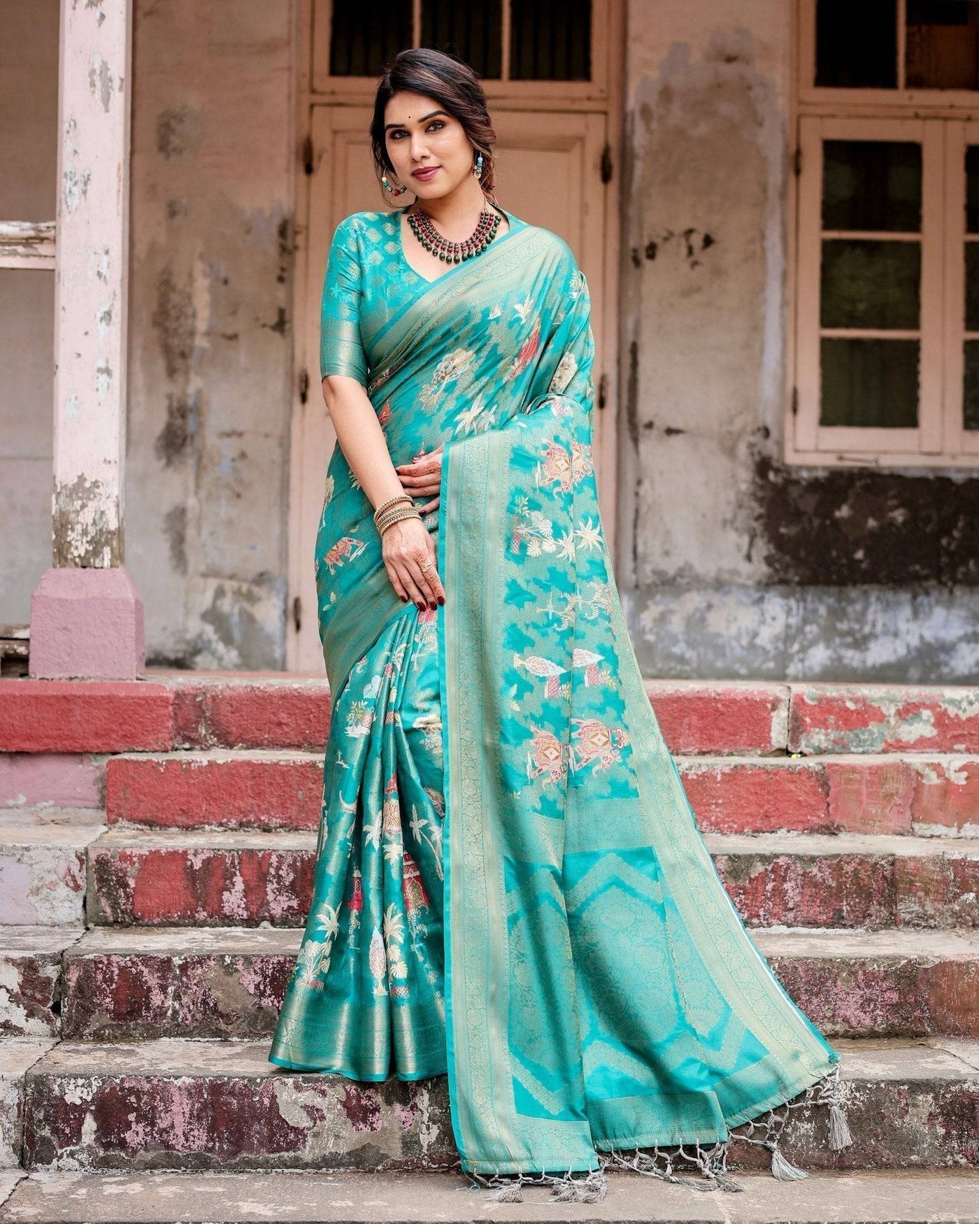 Elegant Teal Green Banarasi Silk Saree with Intricate Zari Weaving and Tassels