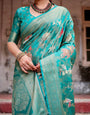 Elegant Teal Green Banarasi Silk Saree with Intricate Zari Weaving and Tassels