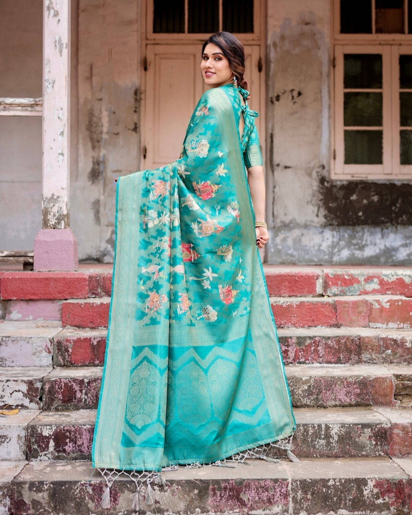 Elegant Teal Green Banarasi Silk Saree with Intricate Zari Weaving and Tassels