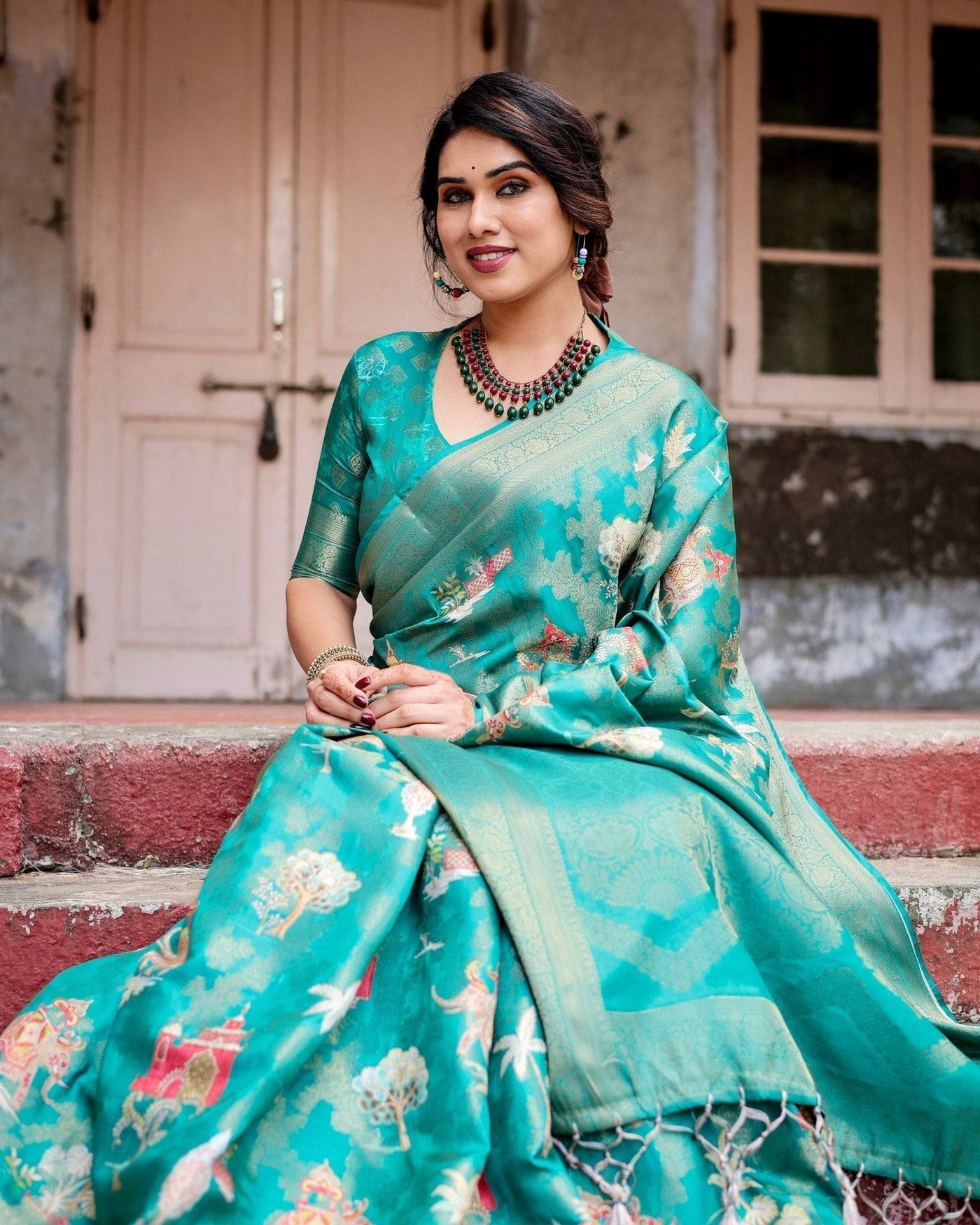 Elegant Teal Green Banarasi Silk Saree with Intricate Zari Weaving and Tassels