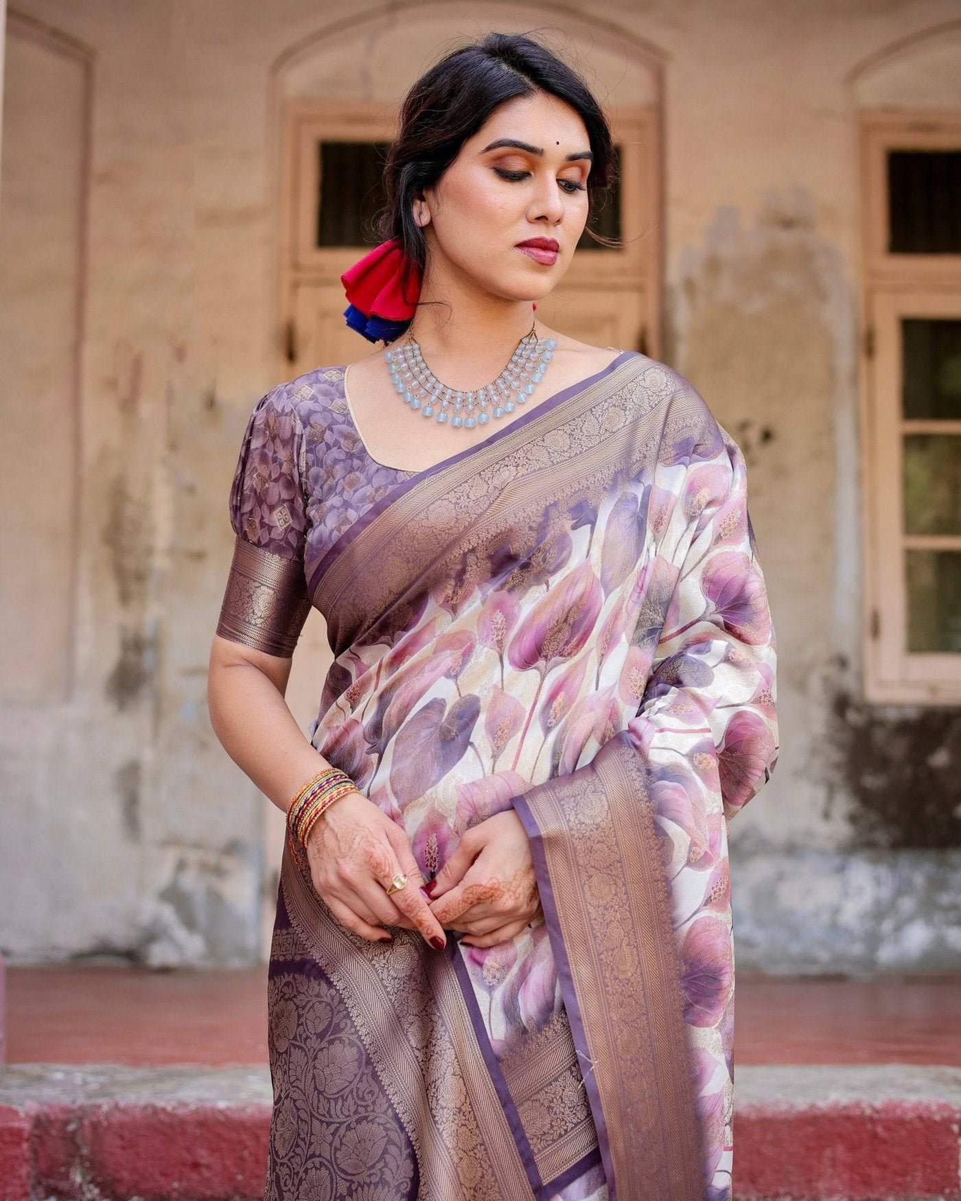 Elegant Purple Floral Banarasi Silk Saree with Intricate Zari Weave and Tassels