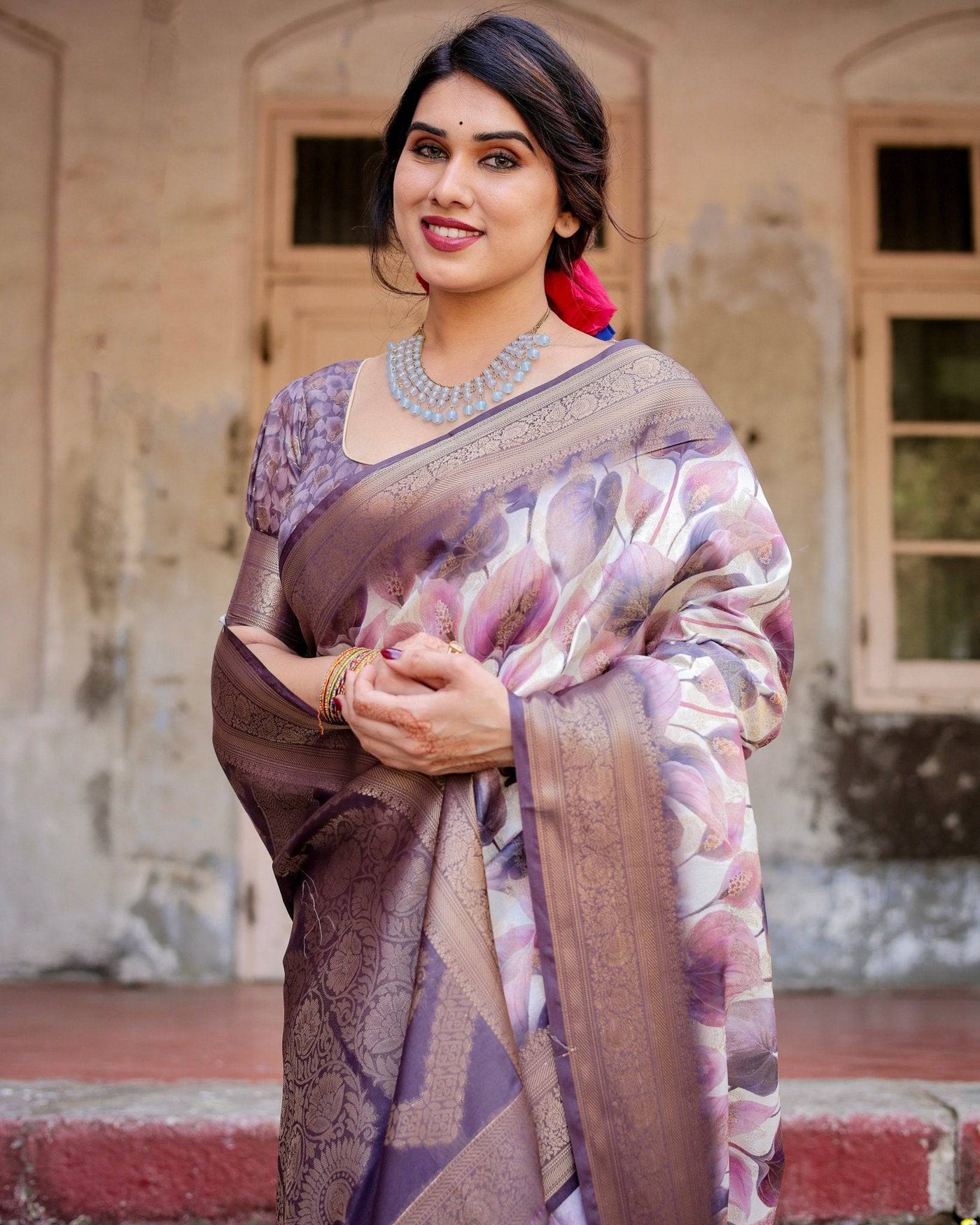 Elegant Purple Floral Banarasi Silk Saree with Intricate Zari Weave and Tassels