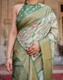 Timeless Green Banarasi Silk Saree with Zari Weaving and Tassels