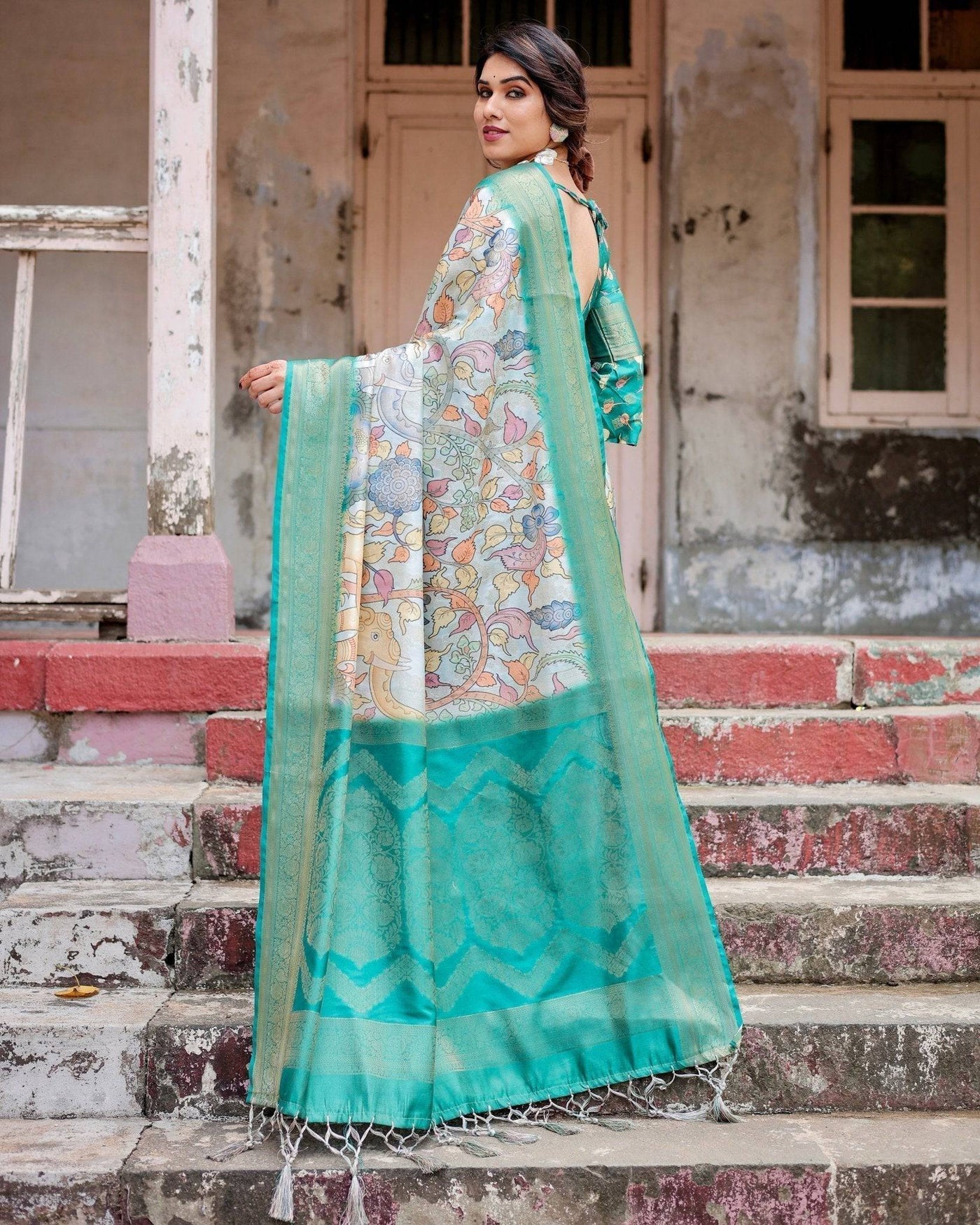 Graceful Green Banarasi Silk Saree with Vibrant Motifs and Zari Woven Pallu