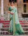 Graceful Green Banarasi Silk Saree with Intricate Floral and Elephant Weaves