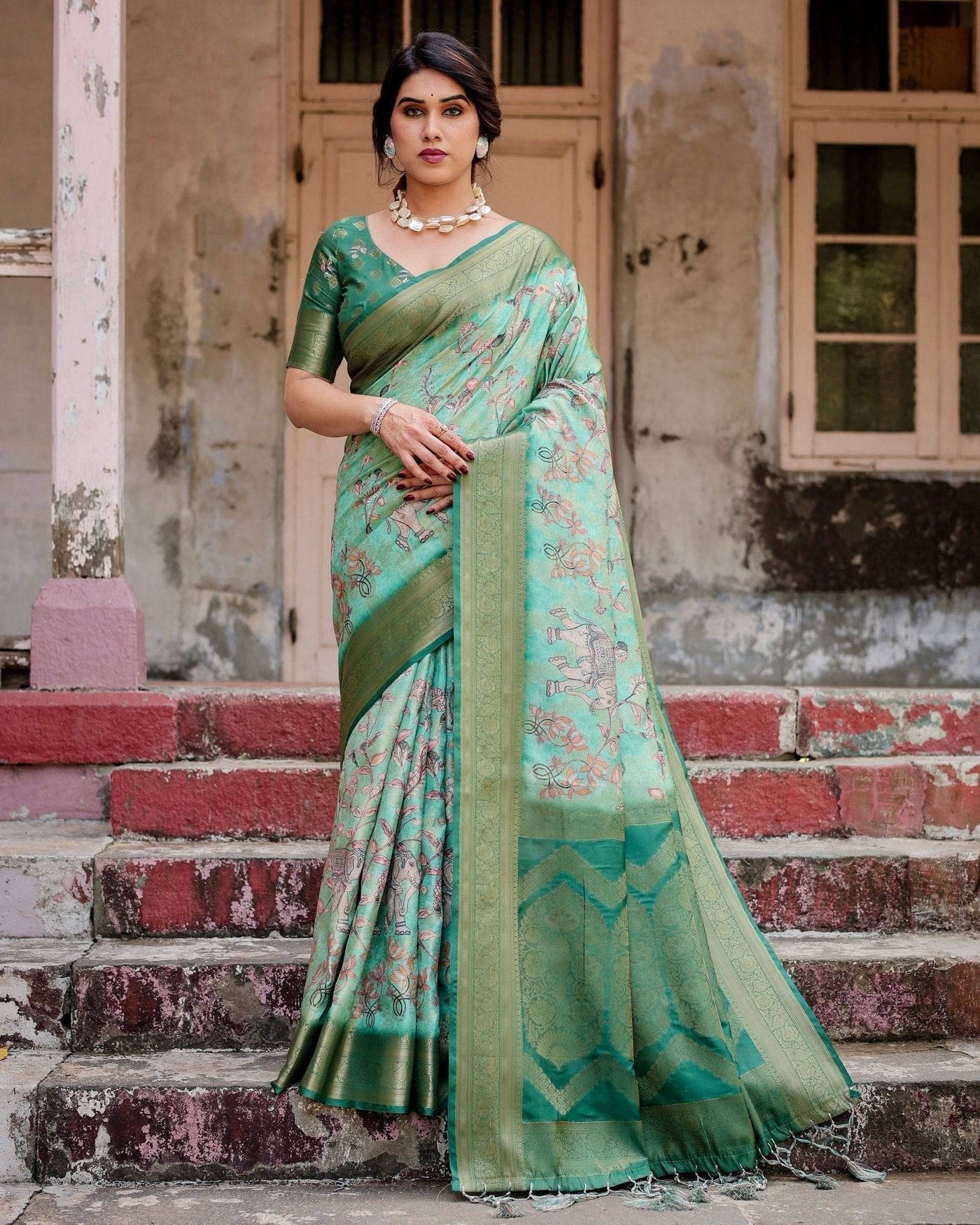 Graceful Green Banarasi Silk Saree with Intricate Floral and Elephant Weaves