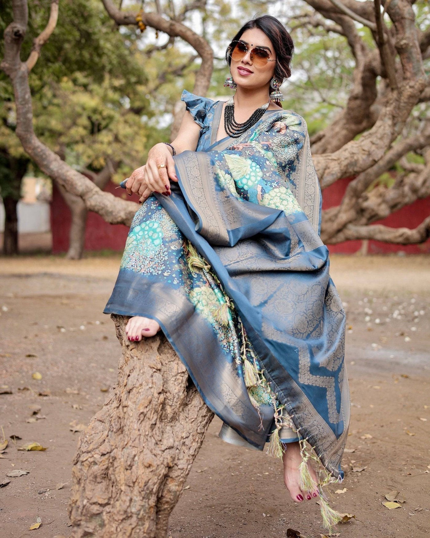 Graceful Navy Blue Banarasi Silk Saree with Nature-Inspired Digital Prints and Elegant Zari Woven Border